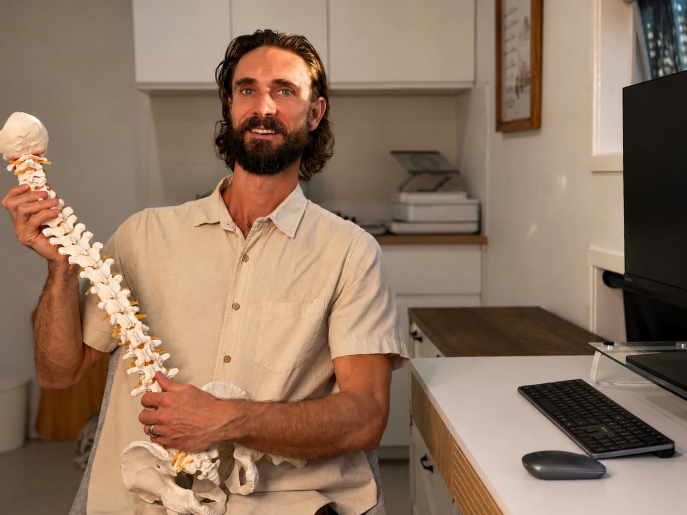Dr Adam Williams providing hands-on care in the private Casuarina studio